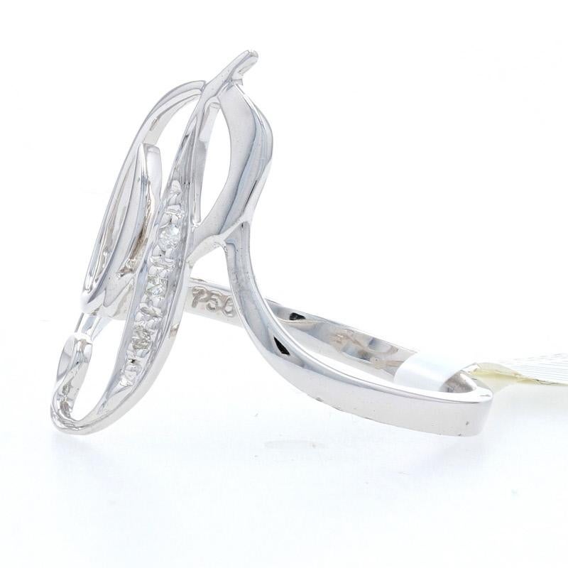 Add a personalized touch to your wardrobe with this fabulous NEW cocktail ring! Composed of glistening 18k white gold, this cocktail ring is fashioned in a graceful bypass style and showcases the letter P done in a flourishing script design. The