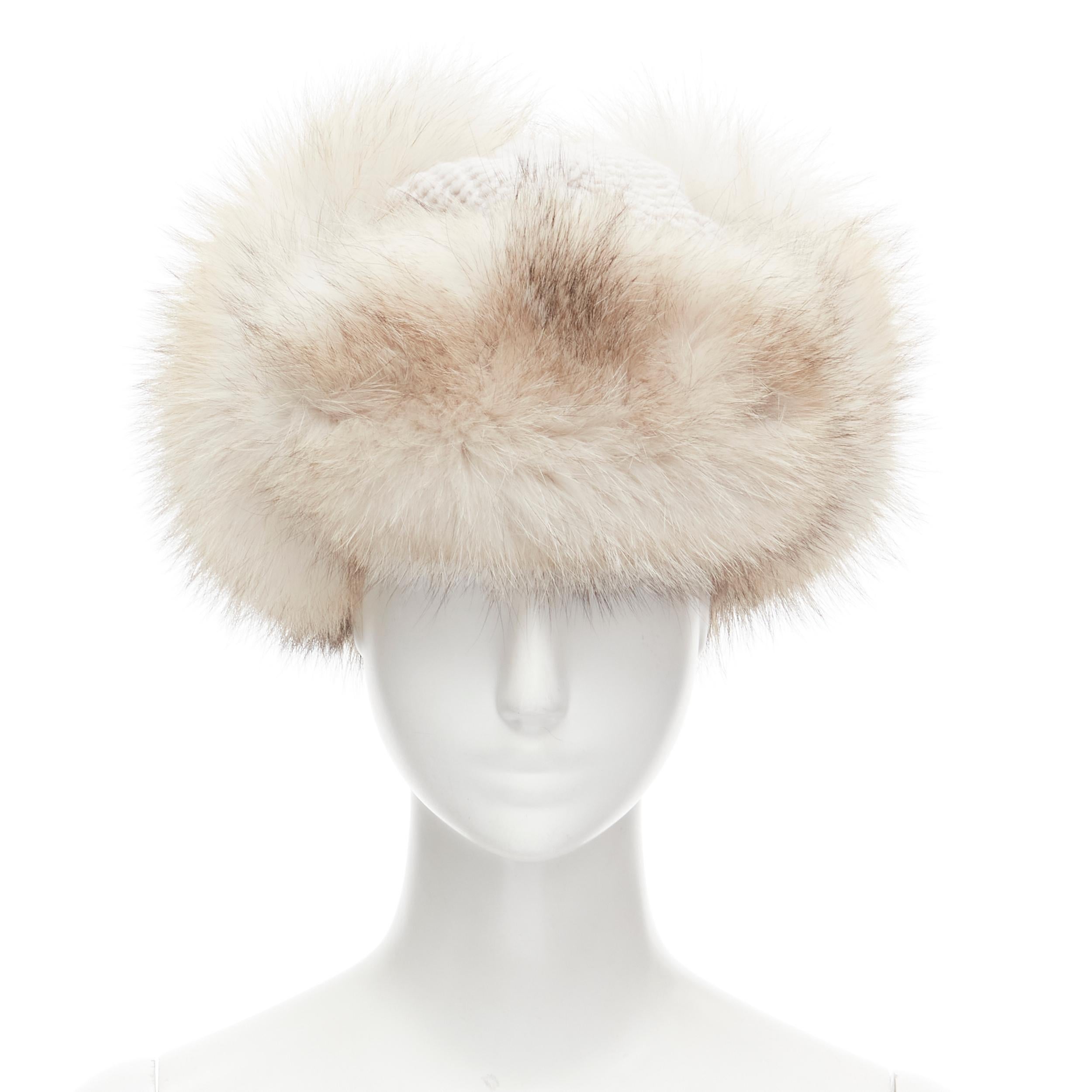 new INVERNI 100% cashmere arctic fox lined chunky cable knit trapper hat sz. 57 
Reference: MELK/A00162 
Brand: Inverni 
Material: Cashmere 
Color: Grey 
Pattern: Solid 
Extra Detail: White leather strap buckle 
Made in: Italy 

CONDITION: