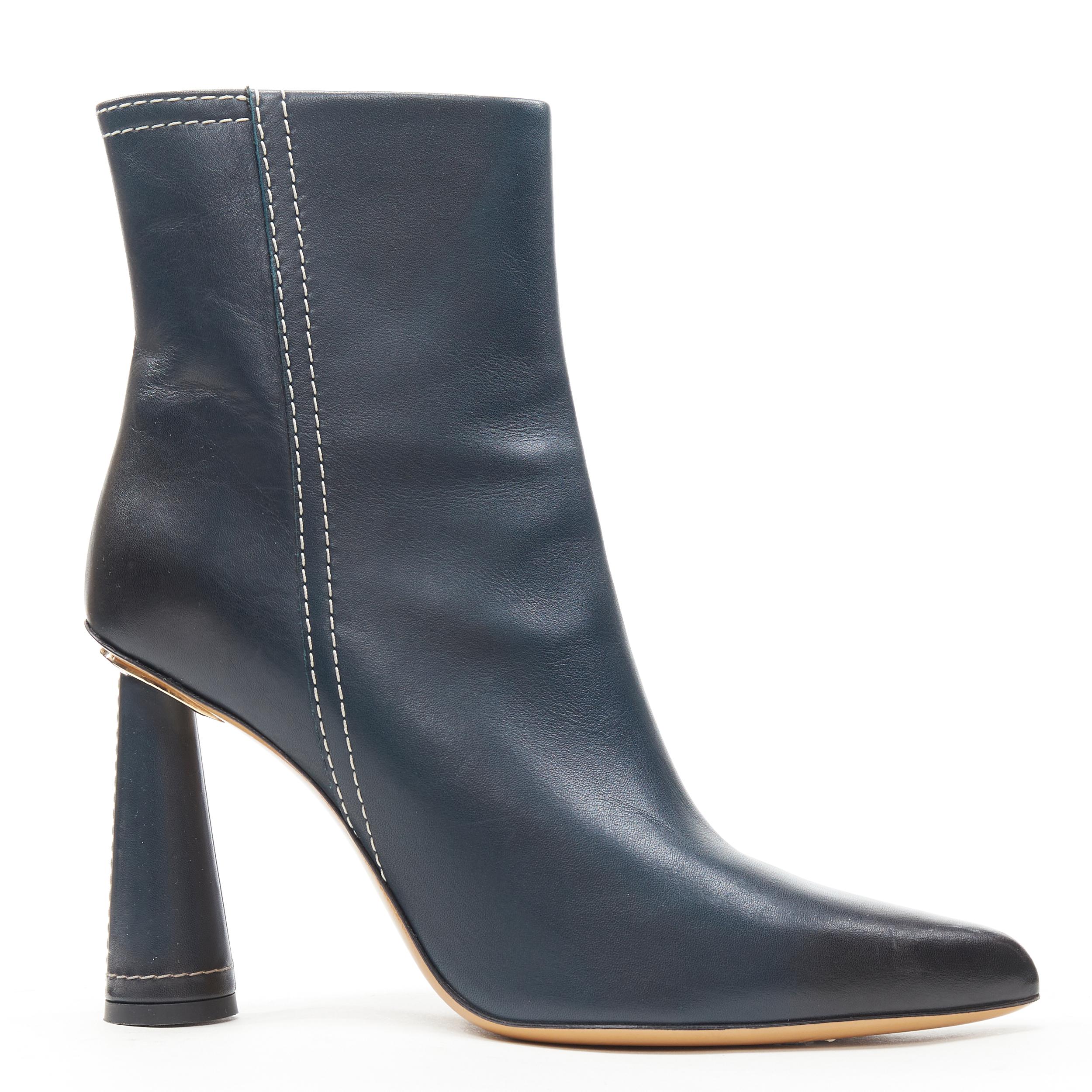 new JACQUEMUS Les Bottes Toula navy blue stitch cone heel ankle bootie EU39 
Reference: TGAS/B01228 
Brand: Jacquemus 
Material: Leather 
Color: Navy 
Pattern: Solid 
Closure: Zip 
Extra Detail: Navy leather. Overstitch stitching detail. Conical