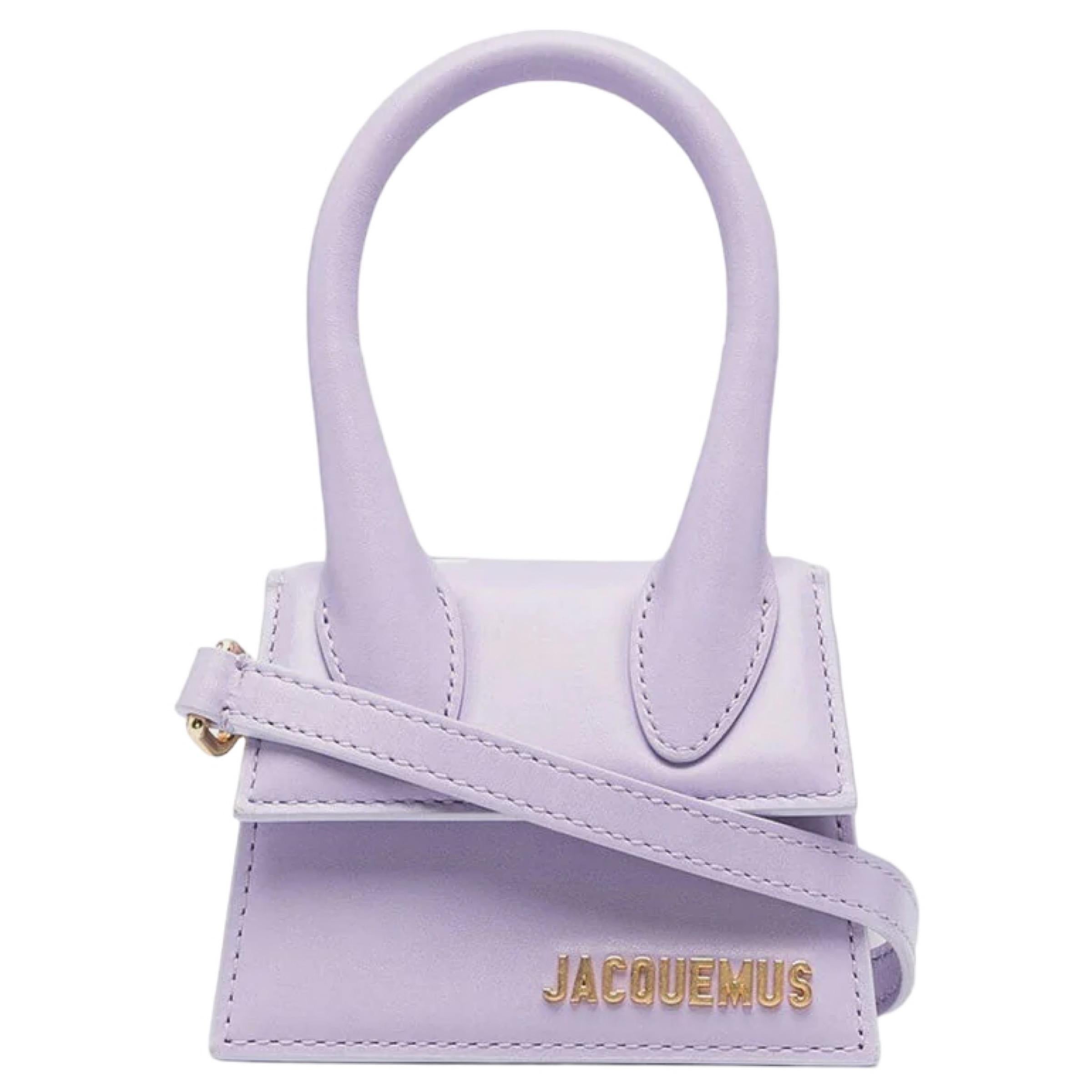 New Jacquemus Lilac Le Chiquito Signature Mini Leather Handbag Crossbody Bag

Authenticity Guaranteed

DETAILS
Brand: Jacquemus
Condition: Brand new
Gender: Women
Category: Crossbody bag
Color: Lilac
Material: Leather
Gold-tone hardware
Front gold