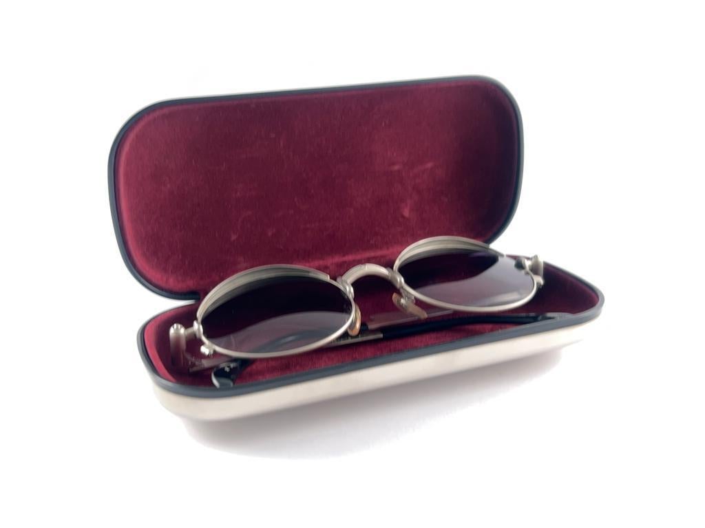Superb Collectors Item!!
New Jean Paul Gaultier 56 4175 Jet Silver Metal Ornaments Frame. 
Spotless Dark Blue Lenses That Complete A Ready To Wear Jpg Look.

Amazing Design With Strong Yet Intricate Details.
Design And Produced In The 1900'S.
New,