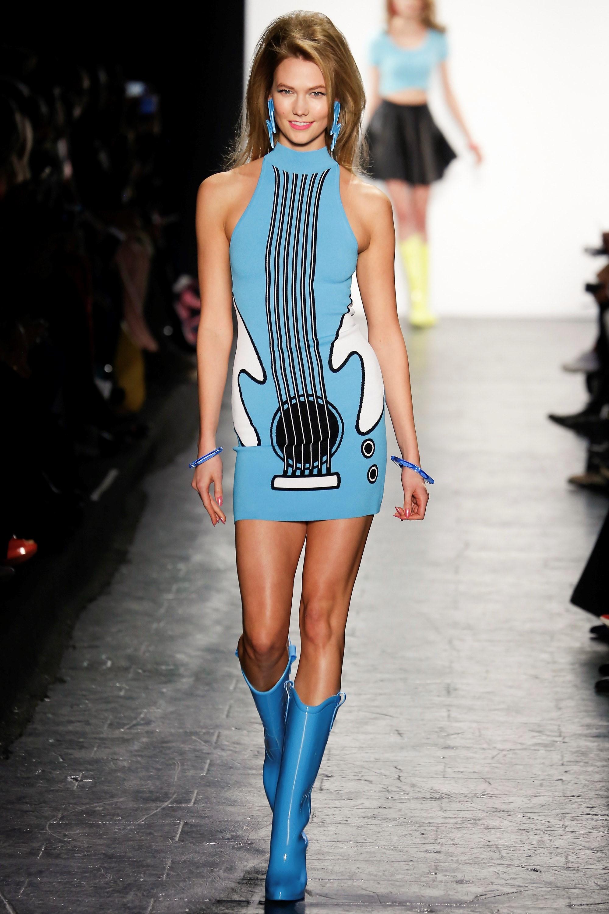 Brand New
Moschino's Jeremy Scott Famous Blue Guitar Dress
Italian Size 38 Bodycon With Plenty of Stretch Available
Runway F/W 2016
Seen on Katy Perry
$990

COMPOSITION
75% Rayon, 25% Polyamide
Made in Italy