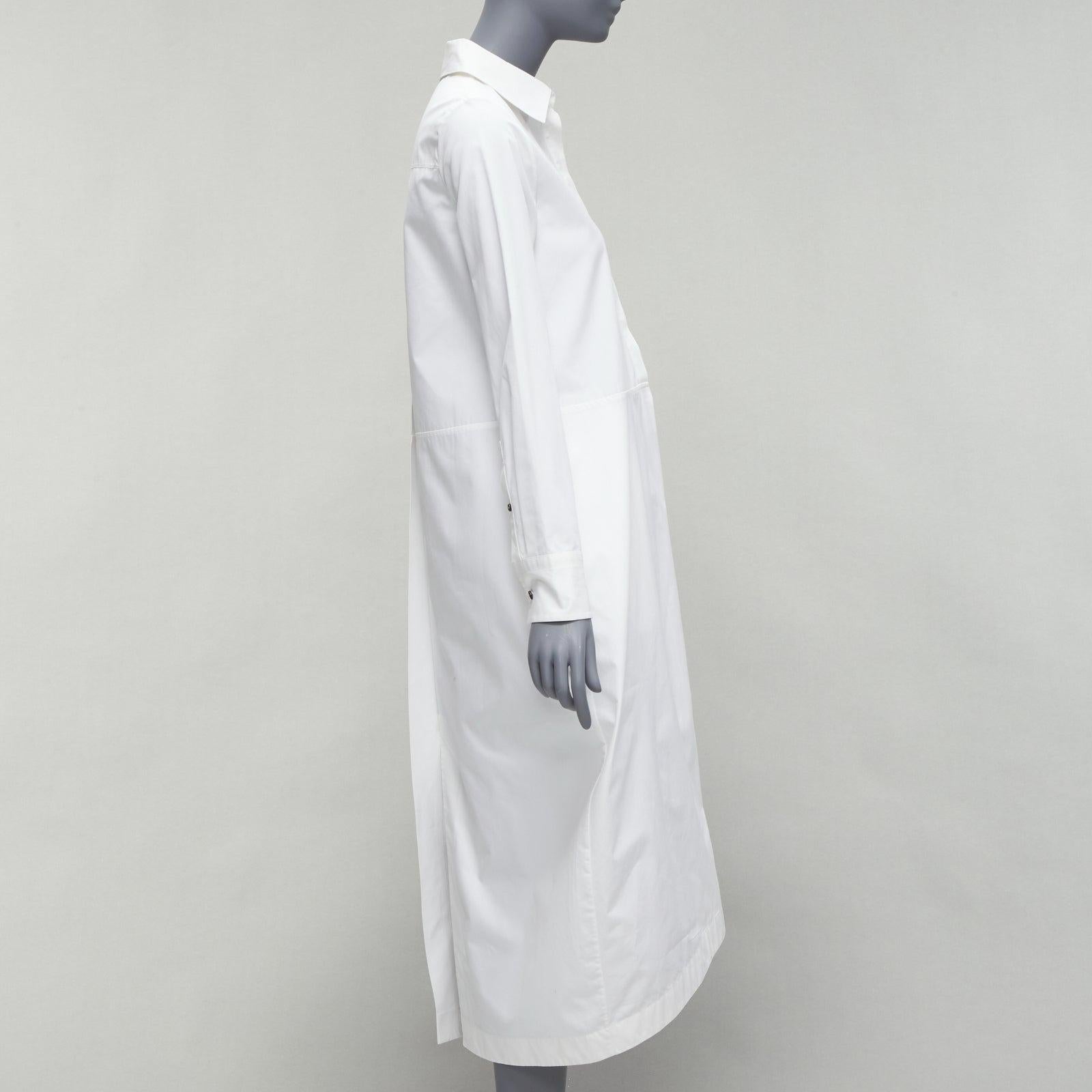 new JIL SANDER 2022 white hidden placket minimal boxy shirt dress FR30 XXS
Reference: SNKO/A00273
Brand: Jil Sander
Collection: 2022
Material: Cotton
Color: White
Pattern: Solid
Closure: Button
Extra Details: Back pleat and back single vent at