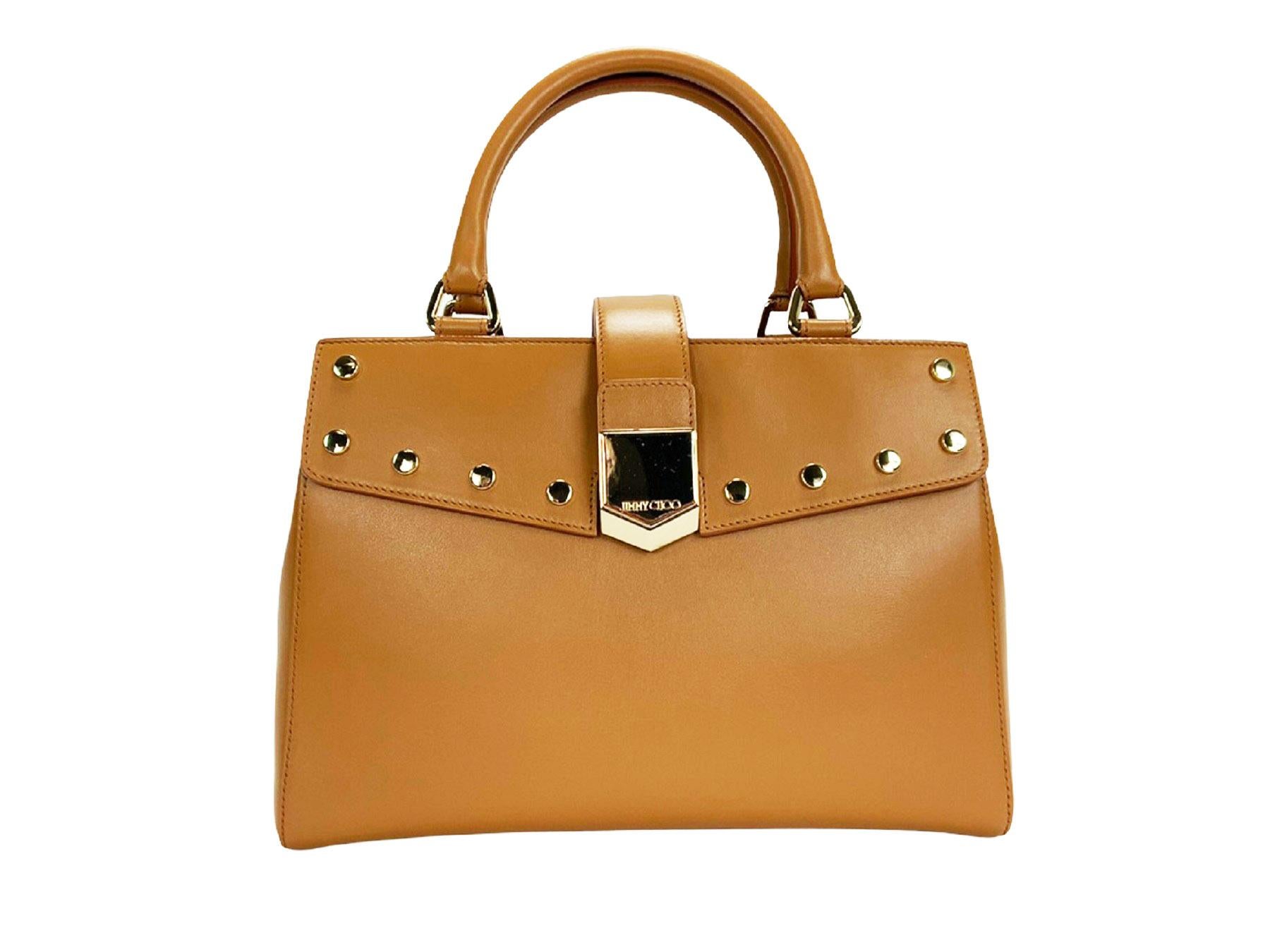 New Jimmy Choo *Lockett* Handbag Tote
Brown Leather, Gold-Tone Hardware, Medium Size, Magnetic Snap Closure, Center Zip Pocket, One Interior Side Pocket. 
Dual Rolled Top Handles, Beige Interior Lining.
Measurements: W - 12 inches, H - 8.5