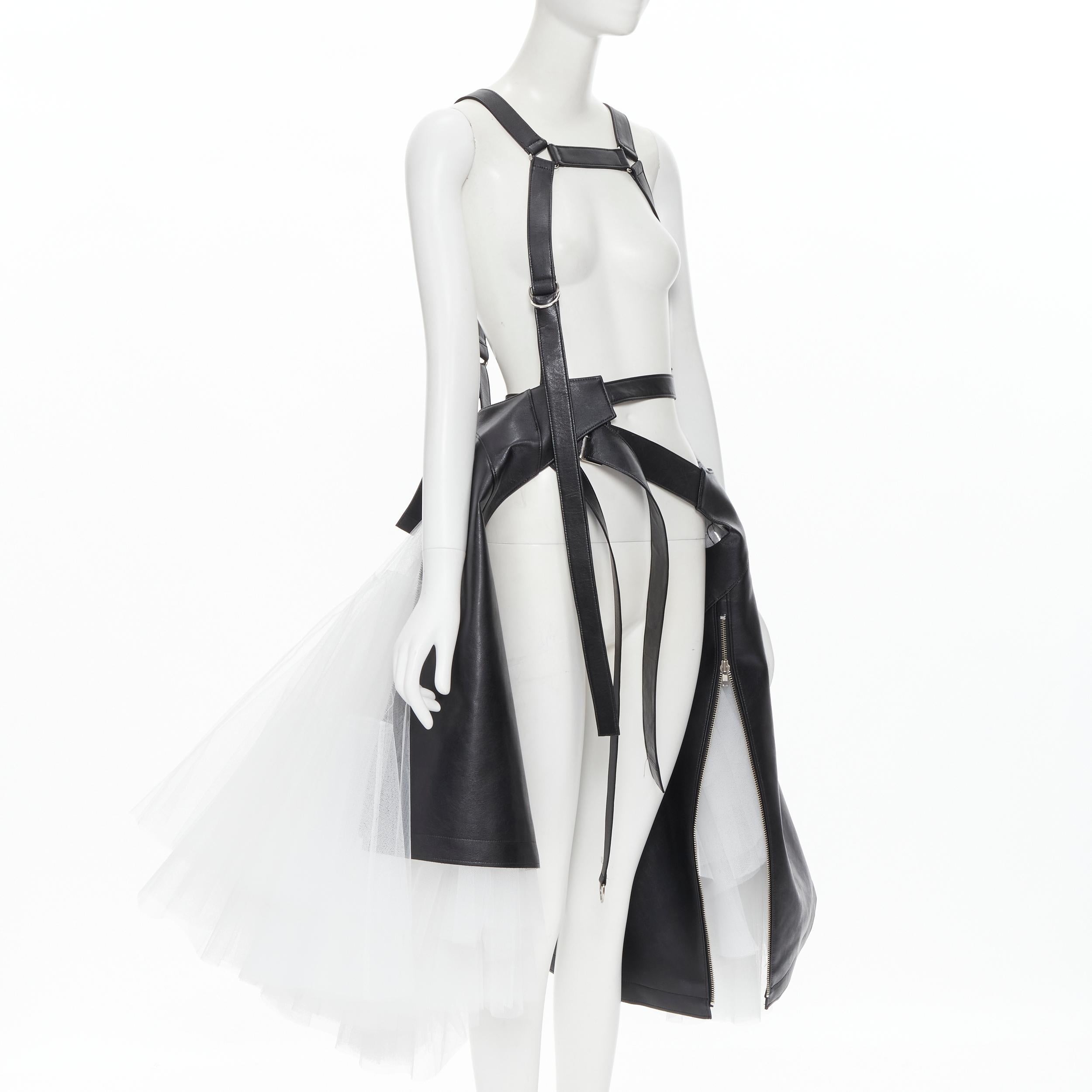 new JUNYA WATANABE Runway black leather white tulle biker harness skirt XS rare Reference: TGAS/B01346 
Brand: Junya Watanabe 
Designer: Junya Watanabe 
Collection: 2020 Runway M
Material: Faux leather 
Color: Black 
Extra Detail: Extremely rare