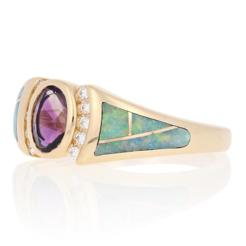 Absolutely gorgeous, this NEW Kabana ring is the perfect gift for any special occasion! The ring is fashioned in classic 14k yellow gold and features a royal-purple amethyst bordered in crescents of shimmering diamonds. Inlaid opals with stunning