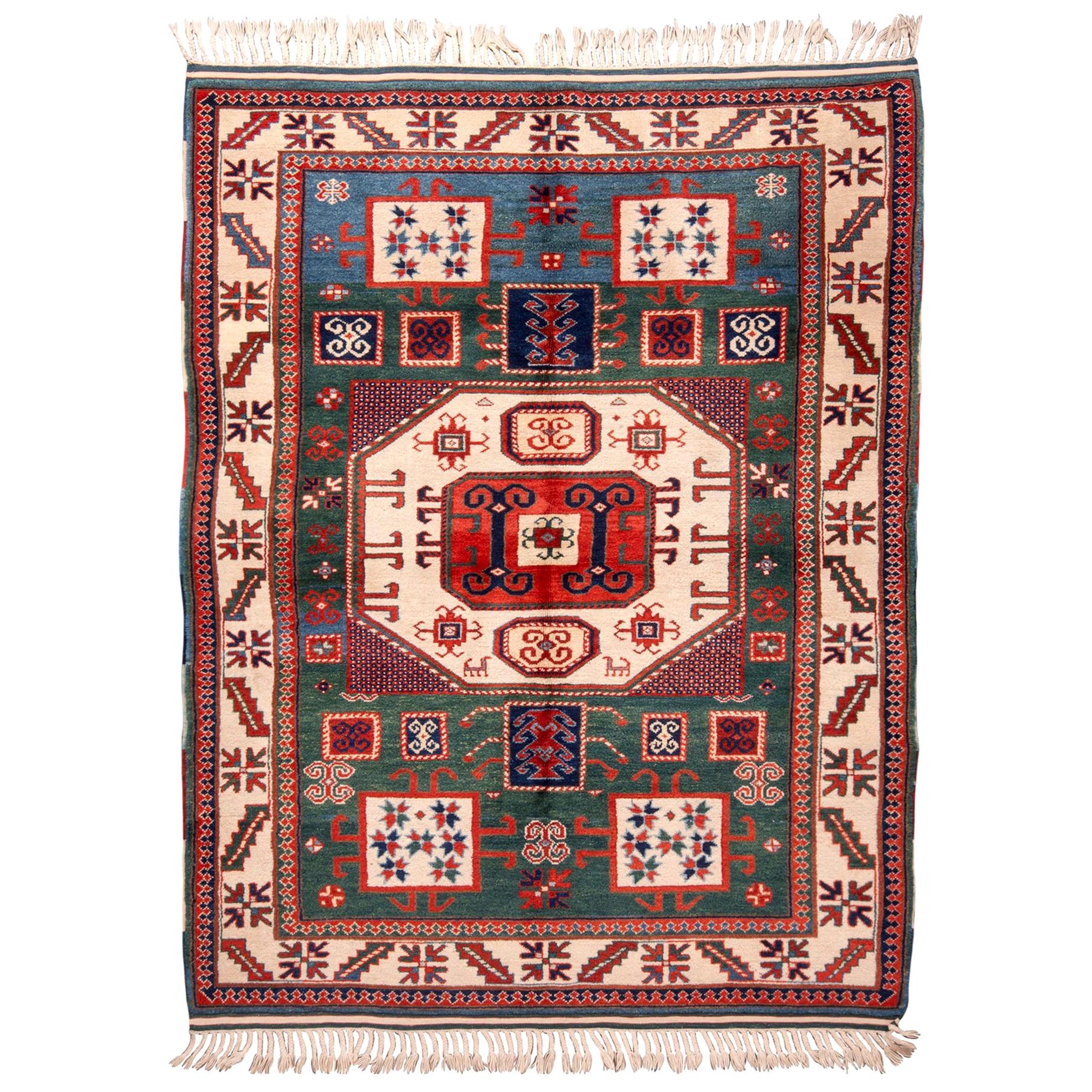 Rug & Kilim's New Kazak Transitional Red and Green Wool Rug with Horn Motifs For Sale