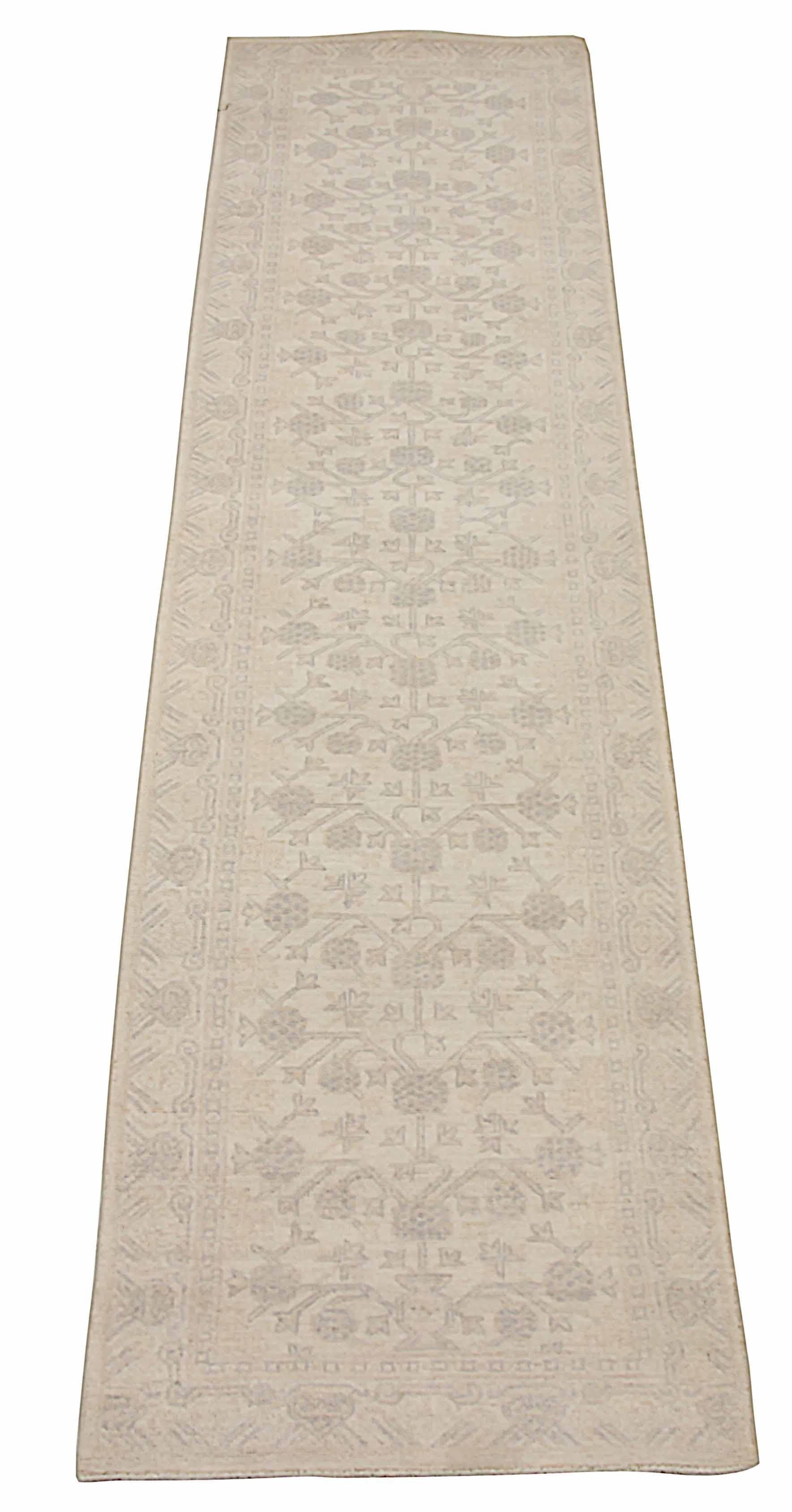 New Afghan area rug handwoven from the finest sheep’s wool. It’s colored with all-natural vegetable dyes that are safe for humans and pets. It’s a traditional Khotan design woven by expert artisans. In addition to the fine weaving, this rug