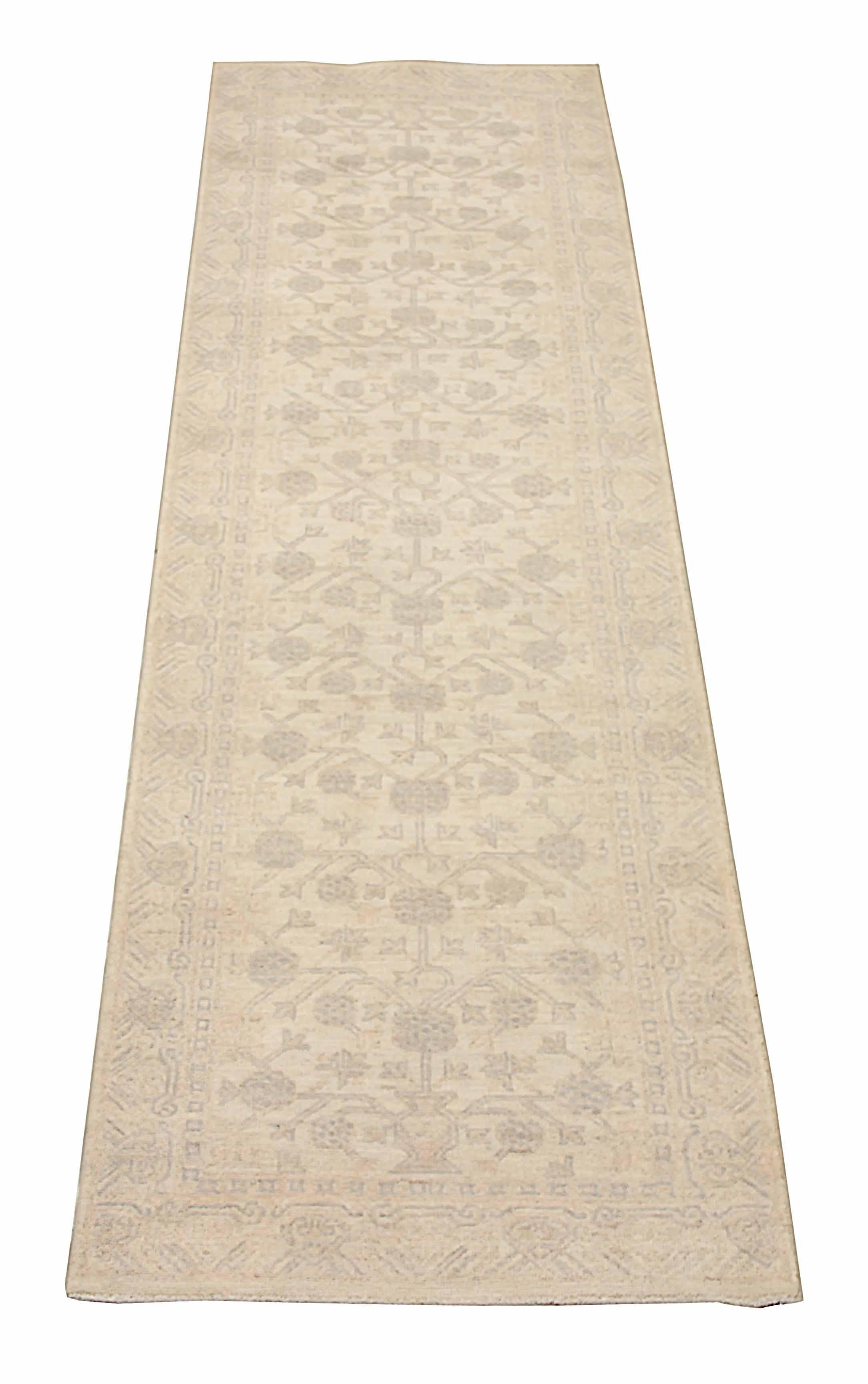 New Afghan runner rug handwoven from the finest sheep’s wool. It’s colored with all-natural vegetable dyes that are safe for humans and pets. It’s a traditional Khotan design woven by expert artisans. In addition to the fine weaving, this rug