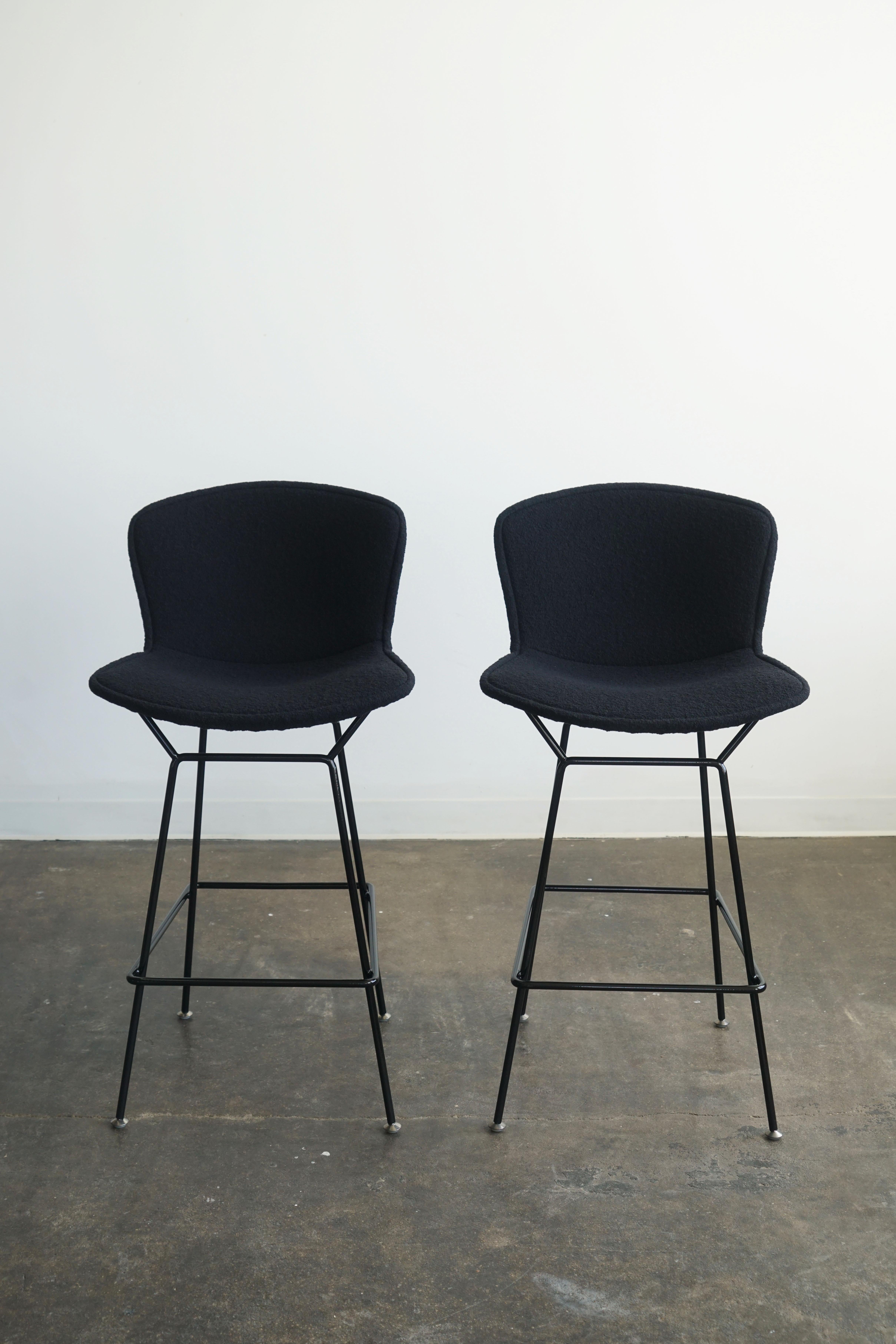 Mid-Century Modern New Knoll Bertoia bar stools in black frame with upholstered black boucle, pair 