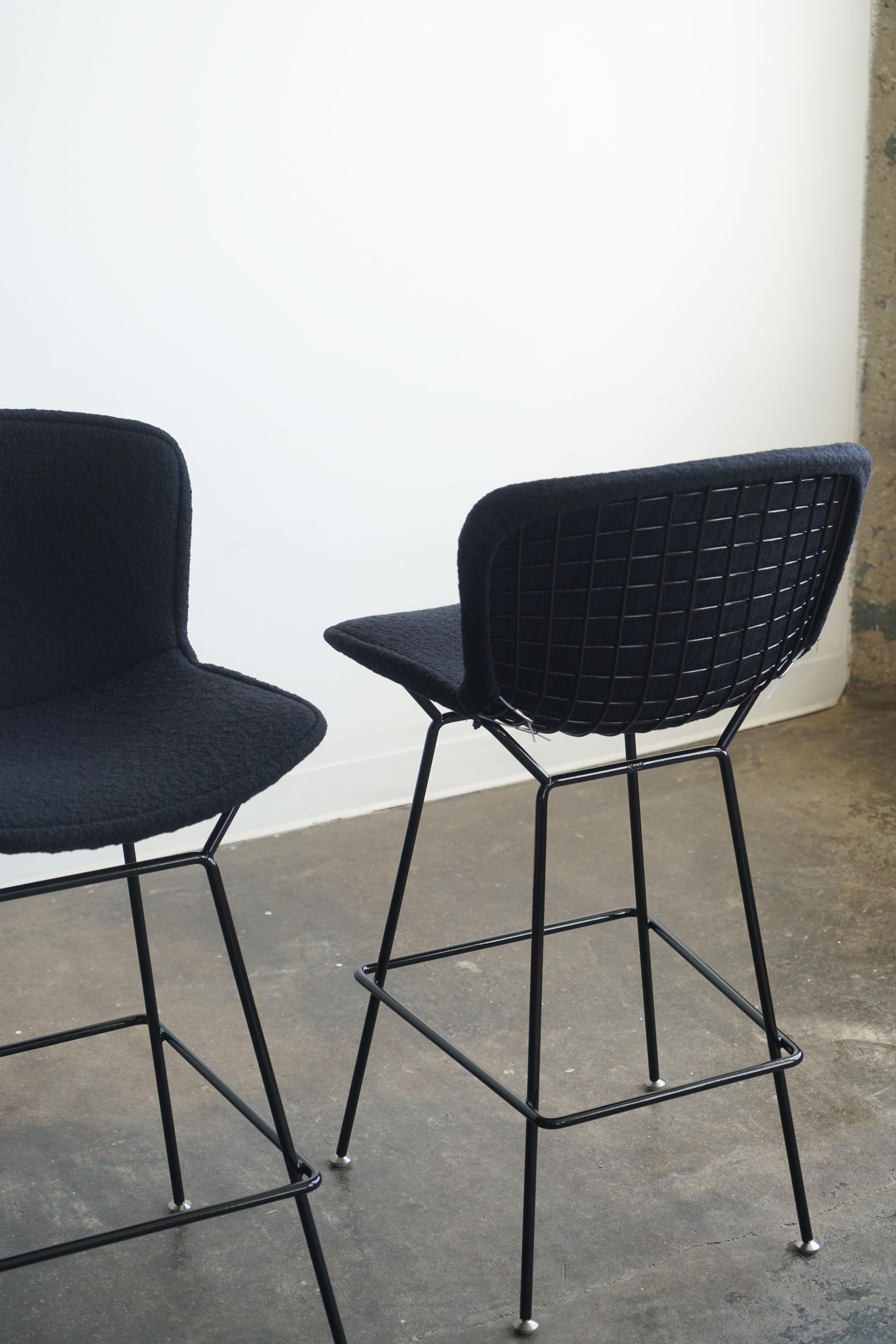 American New Knoll Bertoia bar stools in black frame with upholstered black boucle, pair 
