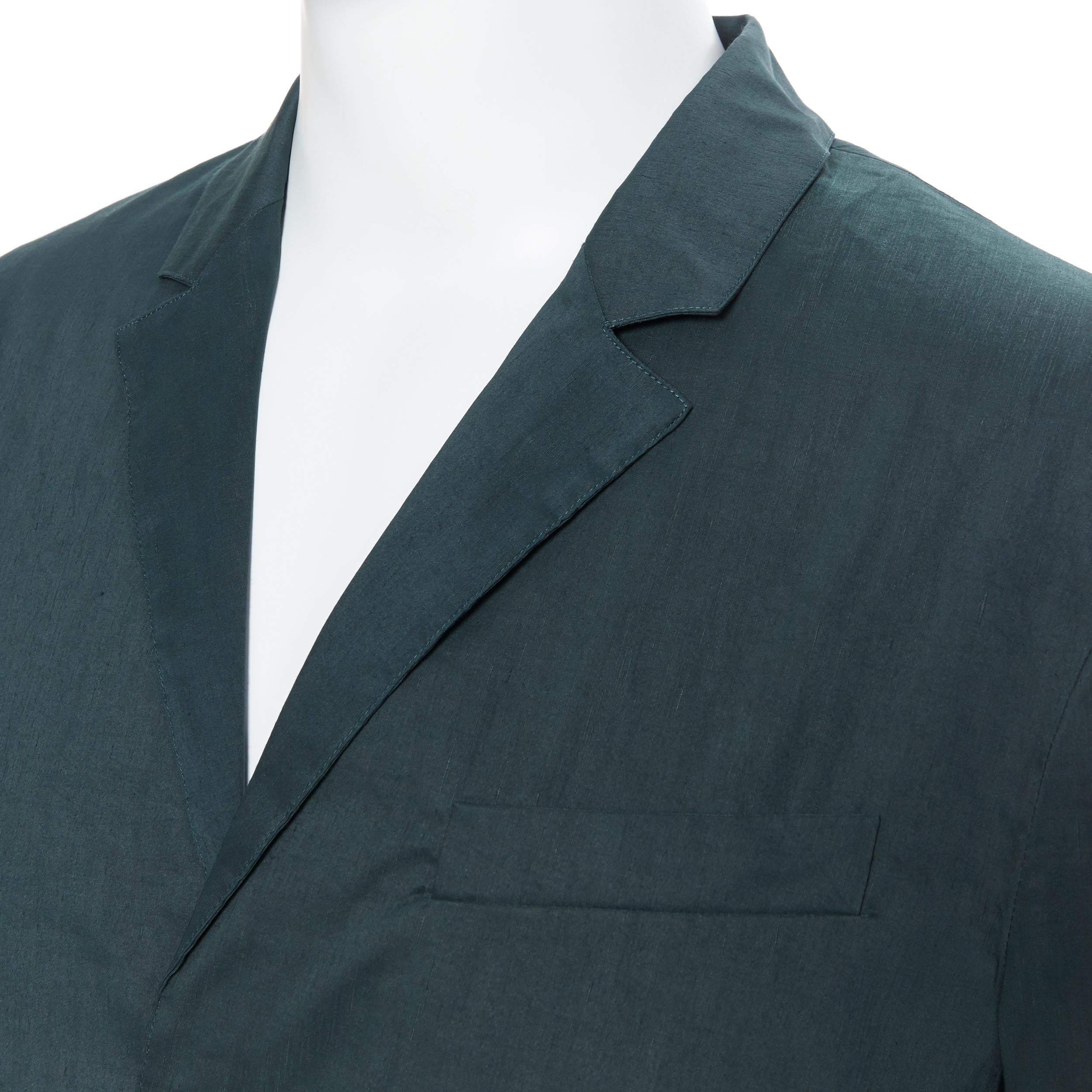 new LA PERLA dark green linen blend notched collar button front pyjama shirt XL
Brand: La Perla
Model Name / Style: Linen shirt
Material: Linen blend 
Color: Green
Pattern: Solid
Closure: Button
Extra Detail: Long sleeve. Collared neckline. Spread