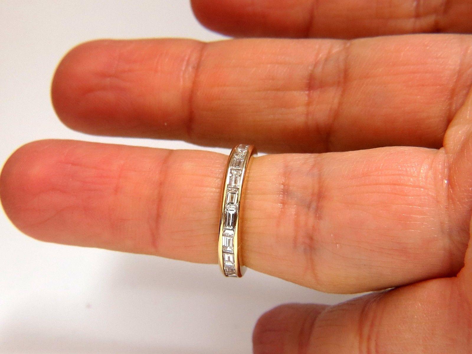 1.00ct. diamonds eternity baguette ring.



All other diamonds: 

G-color 

Vs-2 clarity.

Ring: 3.3mm wide



14kt. yellow gold.

3 Grams

size 5 3/4

Resizing Service is not available.