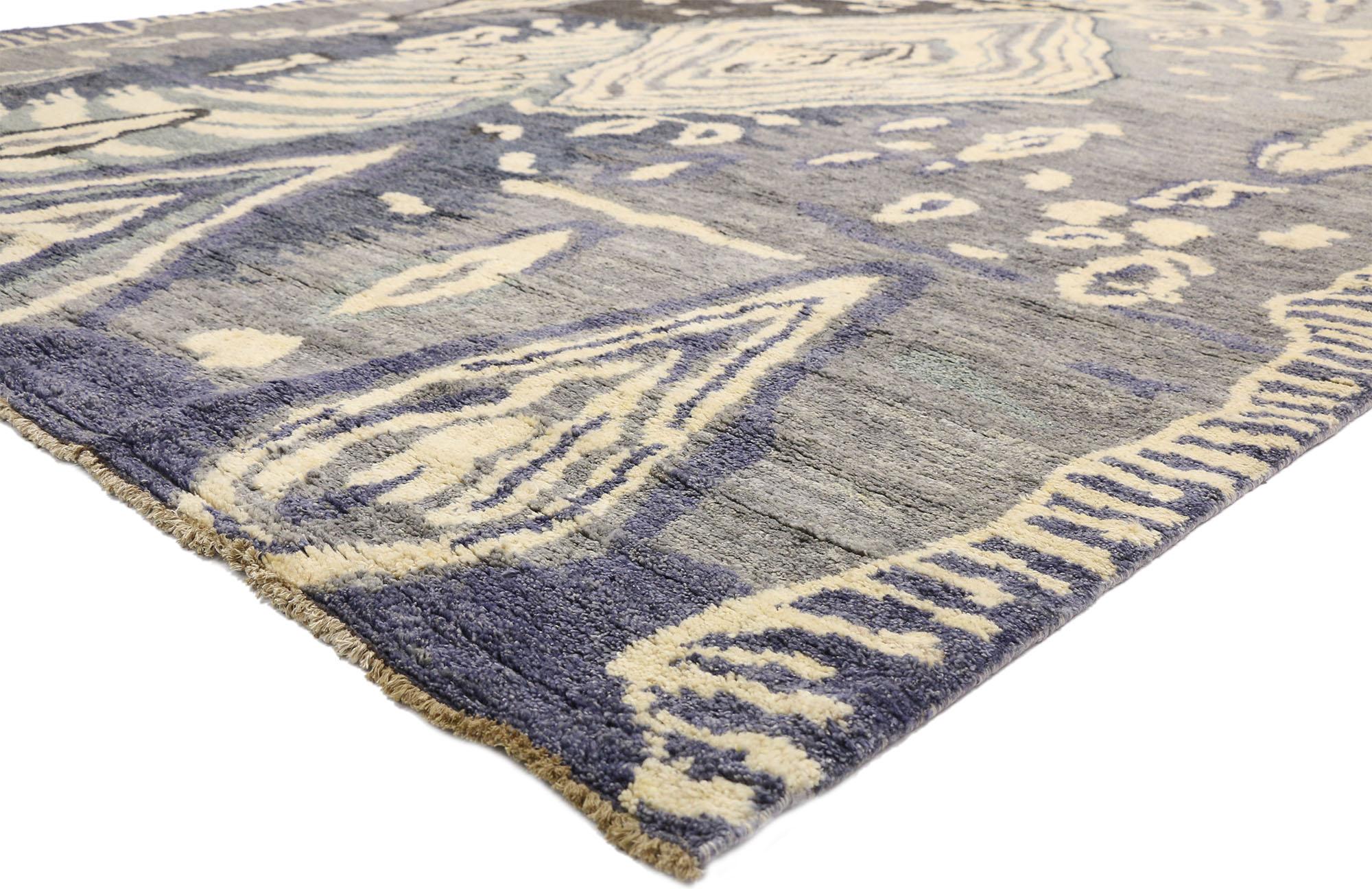 80475 Large Abstract Moroccan Rug, 10'06 x 13'11.
Reflecting esoteric elements with incredible detail and texture, this hand knotted wool large abstract Moroccan rug is a captivating vision of woven beauty. The avant-garde design and dramatic