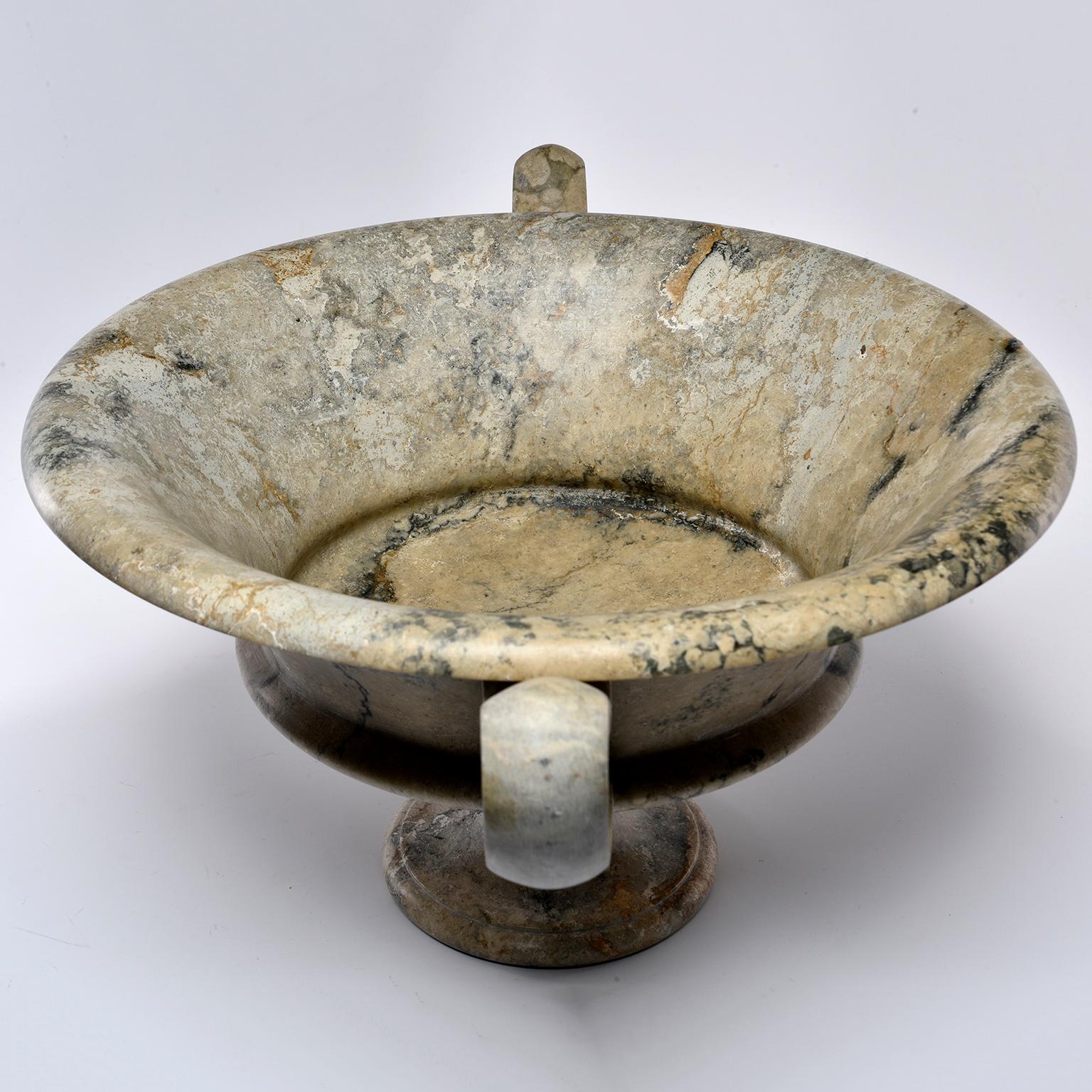 New, large hand carved Italian marble vessel has a pedestal base, wide handles and richly toned taupe marble with gray-green and cream colored streaks. New, custom made with no flaws found.