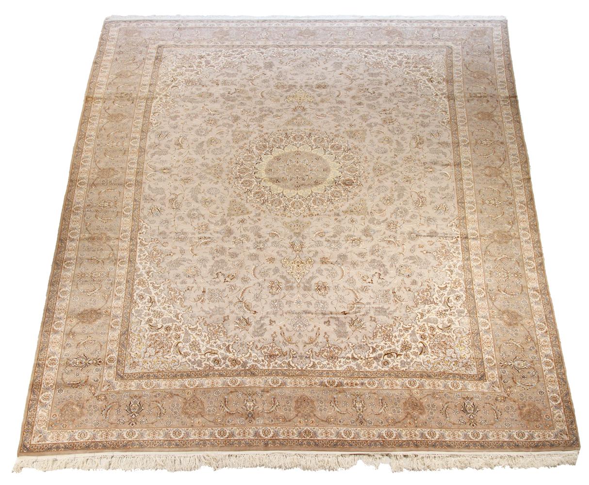 New Persian rug handwoven from the finest sheep’s wool and colored with all-natural vegetable dyes that are safe for humans and pets. It’s a traditional Isfahan design featuring brown and gray floral details. It’s a stunning piece for decorating
