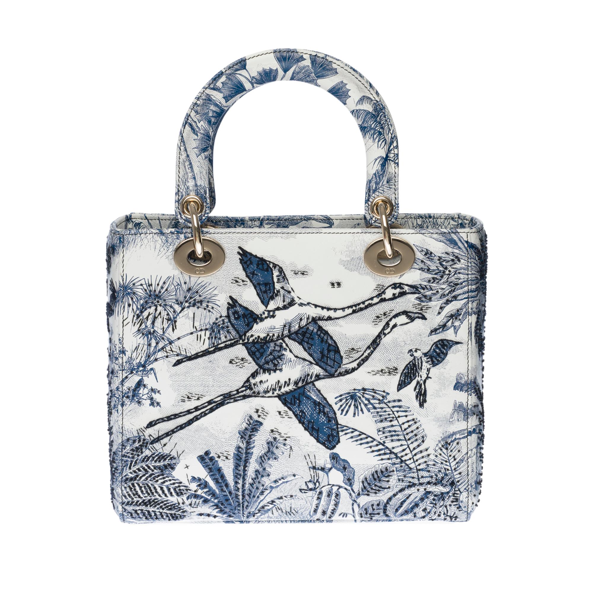 The Lady Dior bag embodies classic elegance combined with the modernity of the House of Dior. This creation is entirely embroidered with the blue and white Toile de Jouy motif, featuring the Maison’s iconic motif through a play of inverted colors.