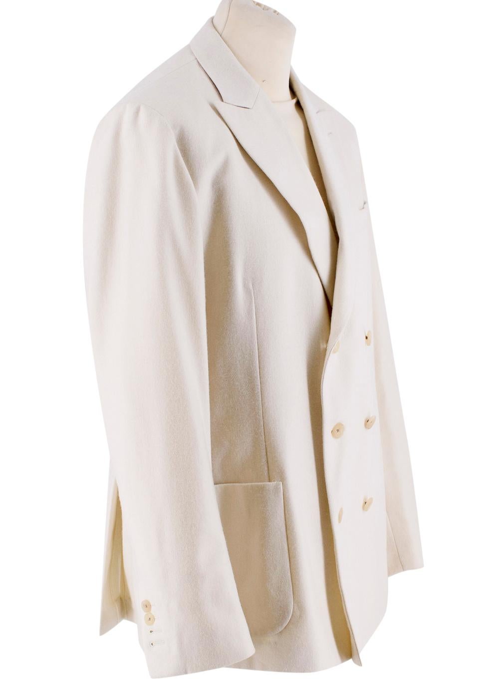 New & Lingwood Ivory Wool Double Breasted Blazer 

-Classic style 
-Fine Cloth by Fox Brothers & Co, made in the west of England  
-Partially lined 
-3 functional outer pockets 
-2 inner pockets with contrasting lining
-Red felt lining under the