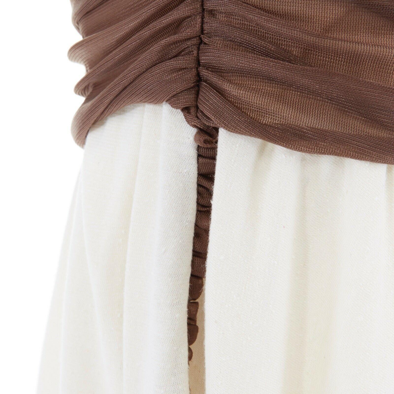 new LOEWE JW ANDERSON Runway AW16 ruched silk washed cotton asymmetric skirt M

LOEWE BY JW ANDERSON
FROM THE FALL WINTER 2016 COLLECTION
Brown silk ruched at waist . Washed pilled beige cotton . Raw hem . 
Asymmetric cotton skirt . Invisible side