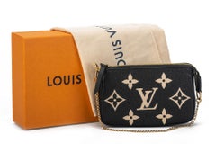 New Louis Vuiton Black Embossed Mini Pochette Bag