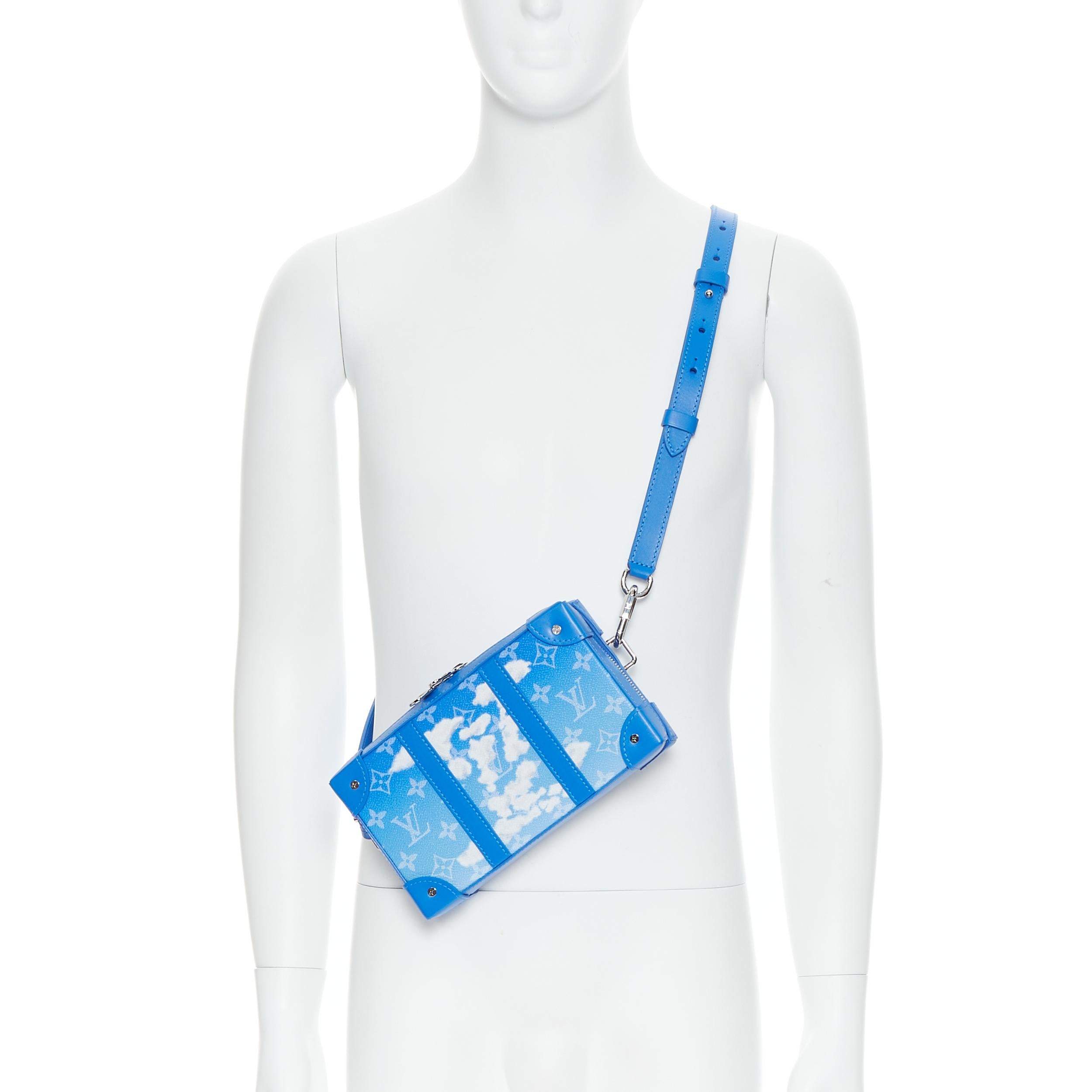 new LOUIS VUITTON 2020 Soft Trunk blue cloud monogram wallet crossbody bag 
Reference: UIHG/A00025 
Brand: Louis Vuitton 
Designer: Virgil Abloh 
Model: Clouds Soft Trunk 
Collection: Fall Winter 2020 
Material: Leather 
Color: Blue 
Pattern: