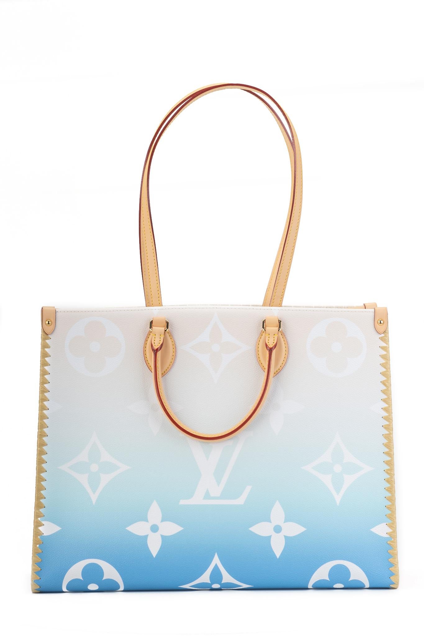 Louis Vuitton 2021 limited edition Summer collection. Saint Tropez ultra limited VIP edition. Brand new in box with original dust cover. Large on the go in ombre pink monogram canvas. Sides are made of raffia, cowhide trims and straps, flower charm.