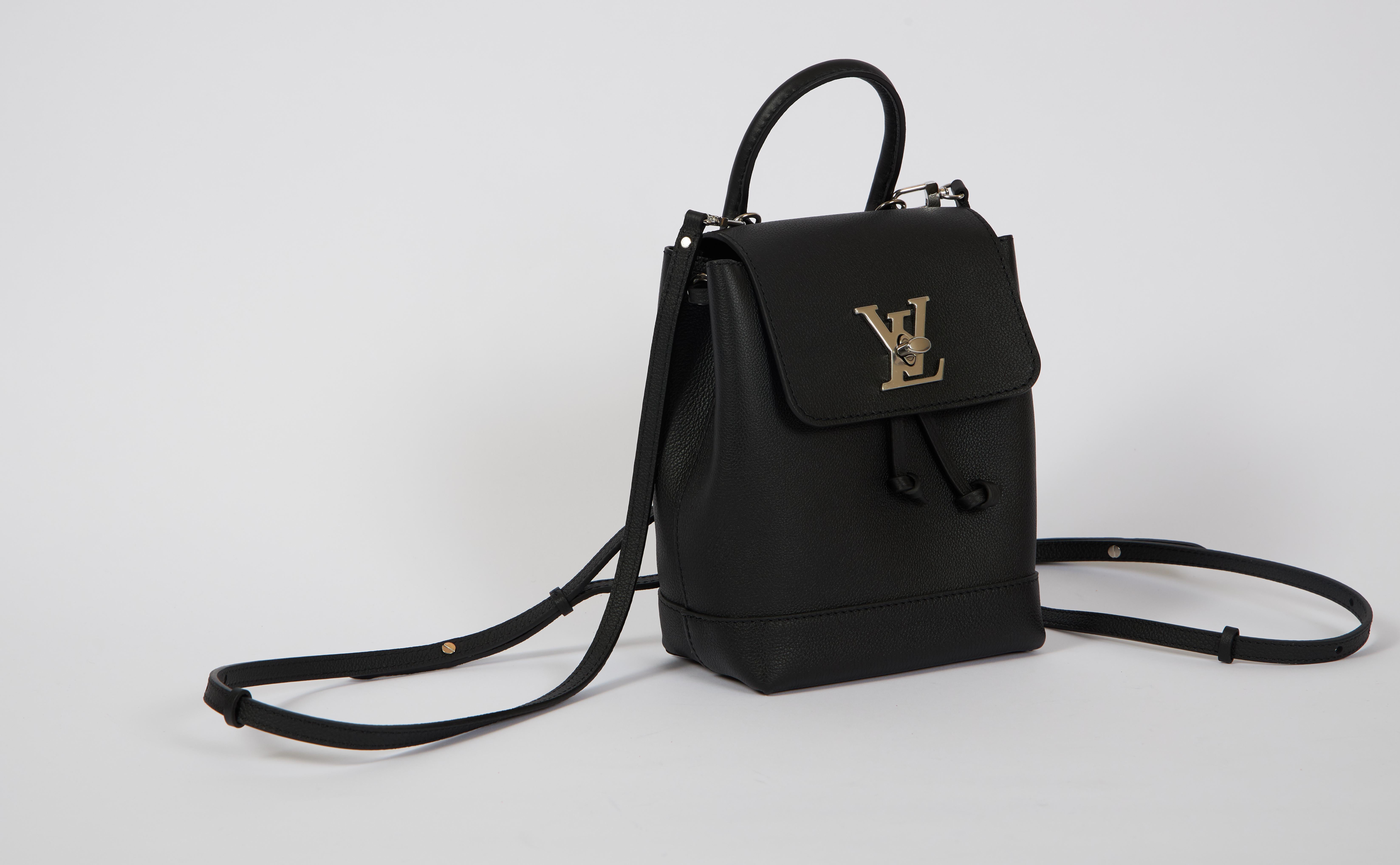 Louis Vuitton SOLD OUT limited edition lockme mini backpack in black leather and silver metal. Very versatile and young can be worn also as cross body. Brand new in box , comes with dust cover , box and shopper.