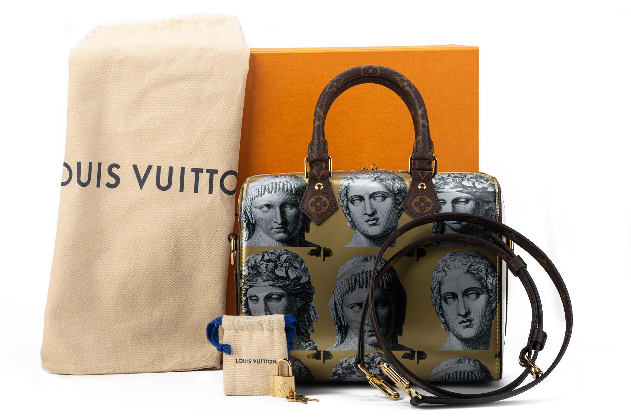Louis Vuitton 2021 limited edition Fornasetti collection designed by Nicolas Ghesquière. Sold out worldwide speedy bandouliere 25 cm in printed patent leather, gold metal hardware and vuitton coated canvas monogram details.Detachable strap, lock and