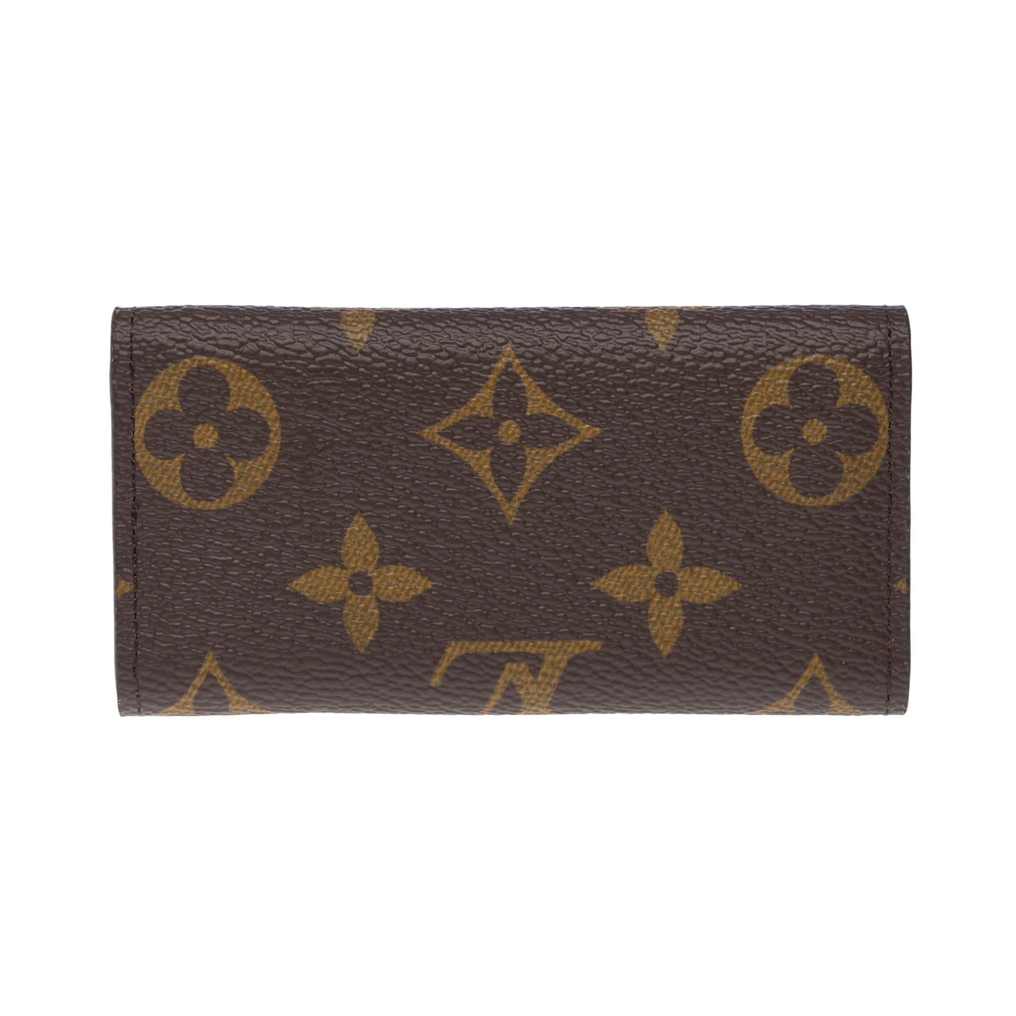 Nouveau Porte-clés Louis Vuitton en toile monogramme marron, GHW Unisexe en vente