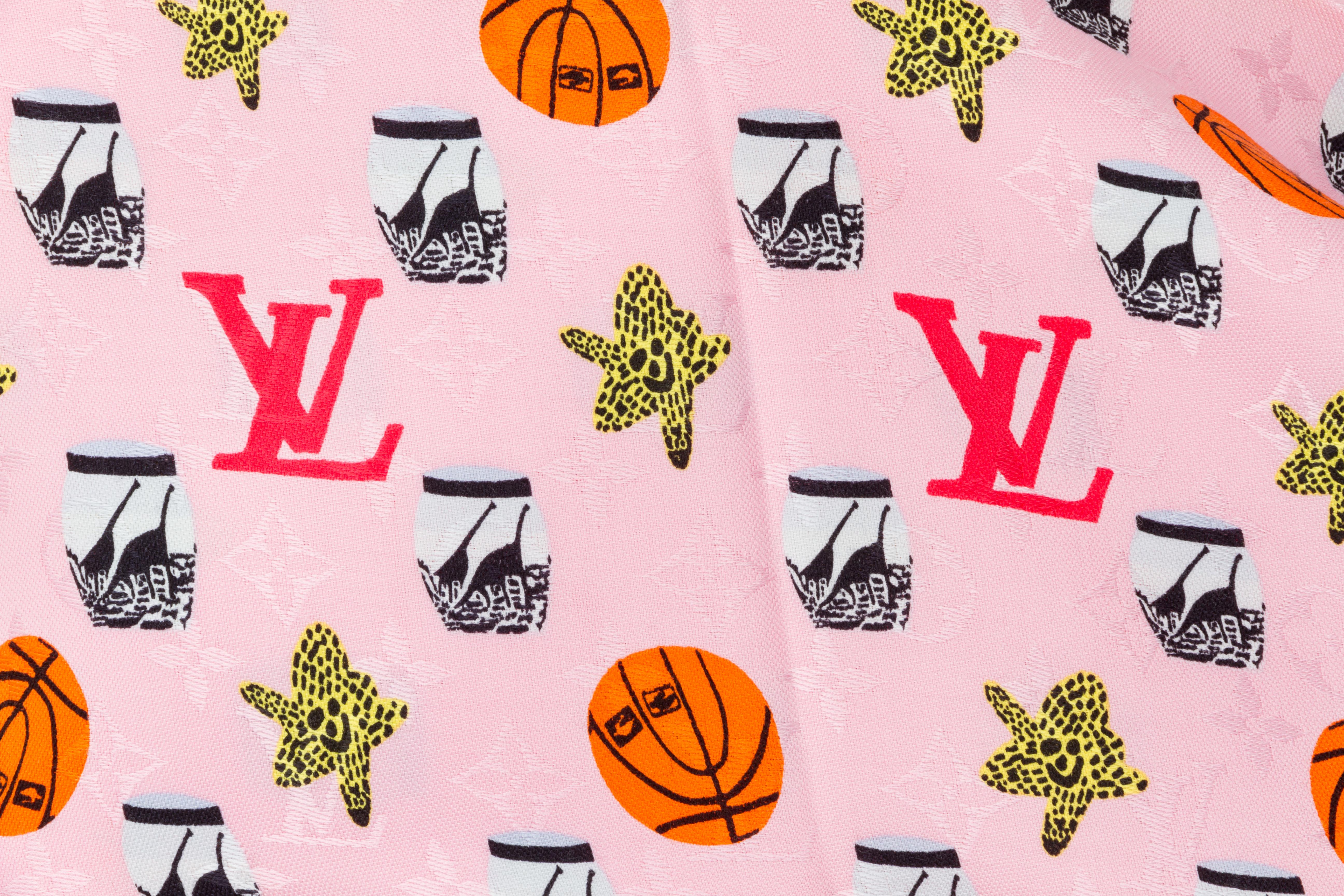 Louis Vuitton limited edition oversized pink silk and wool shawl with basketballs and logos design. Jacquard weave. Fringe finish. 
60% silk, 40% wool