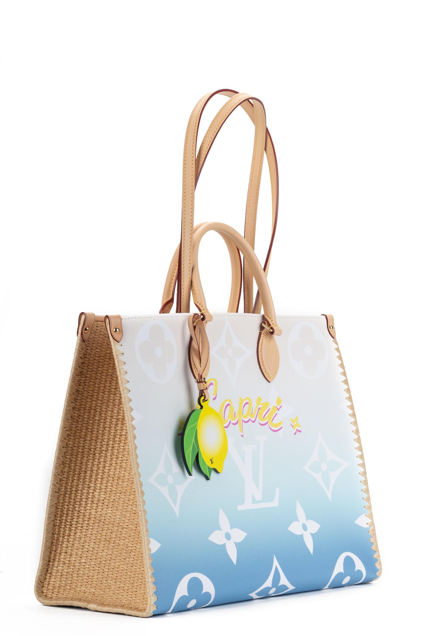 Louis Vuitton celebrates the summer and the reopening of its resorts in the most beautiful Italian holiday destinations with a new and exclusive limited edition of the famous OnTheGo tote bag. Limited edition Capri bag with signature lemon charm.
