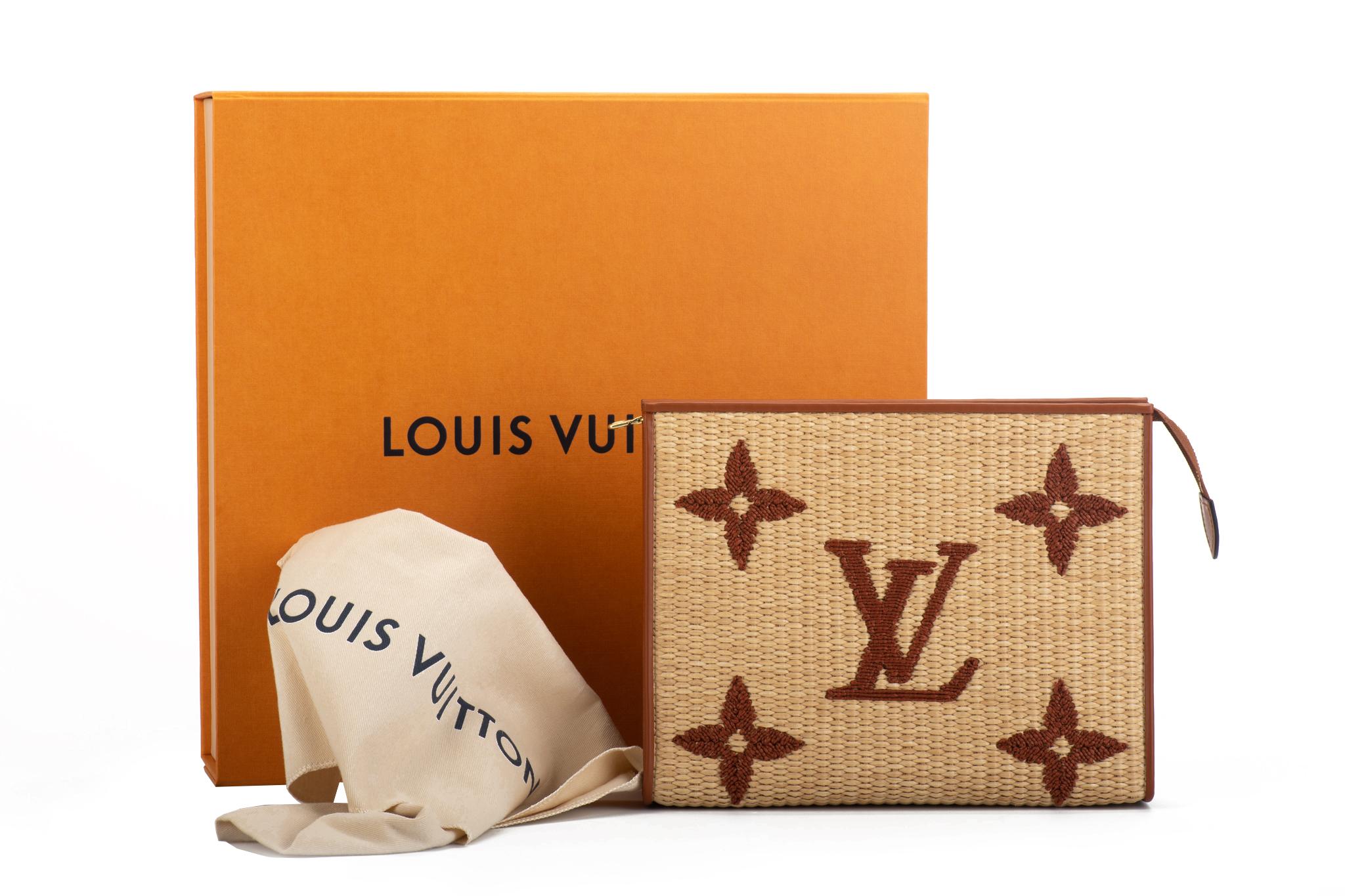 Louis Vuitton limited edition raffia clutch with caramel brown leather trimming and oversize embroidered logo. Striped fabric interior lining. Brand new with original dust cover and box.