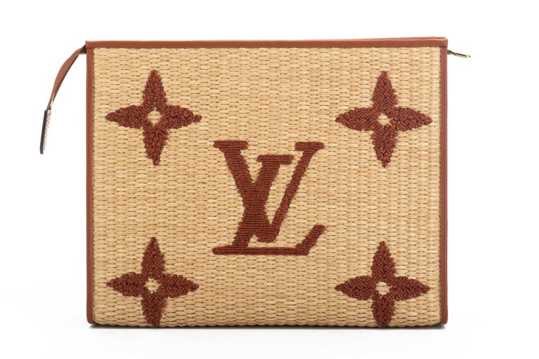 accessorized with a straw hat featuring a large brim and a Louis Vuitton  logo clutch bag, RvceShops Revival