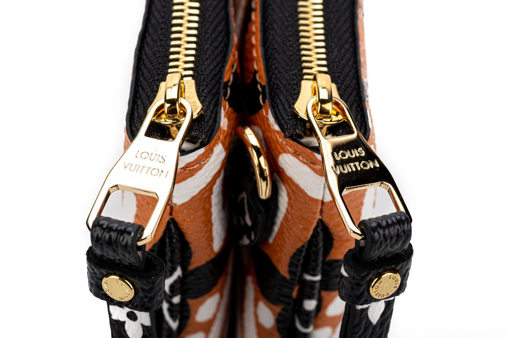 New Louis Vuitton Limited Edition Tribal Double Pochette Bag 1