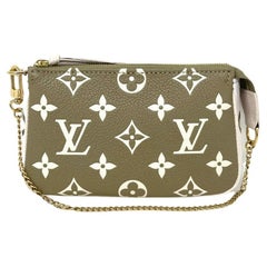 NEW Louis Vuitton LV Monogram Empreinte Leather Mini Pochette Accessories Clutch