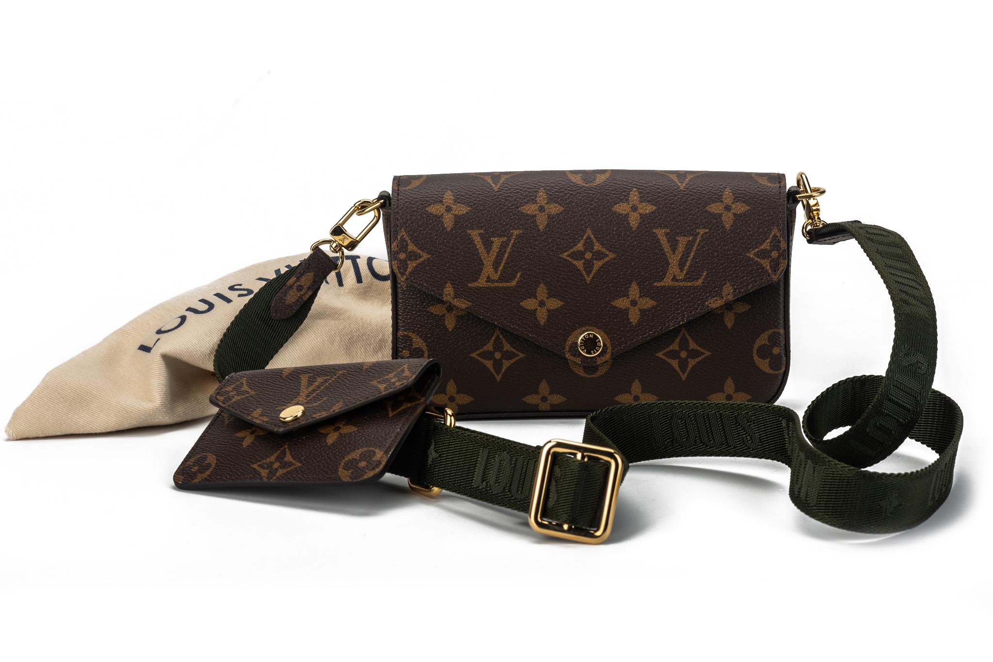 Louis Vuitton mini felicie multi pochette in brown classic monogram coated canvas and khaki green strap. Green epi leather interior lining. Brand new with original dust cover and box.