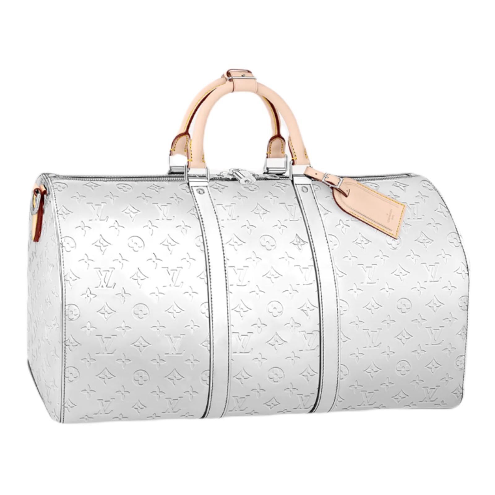 Brandnew Louis Vuitton Monogram Mirror Canvas Keepall 50 Bag

Sold out available with months-long waiting list

Fresh from store, full set with dustbag and box, never worn.

This Keepall Bandoulière 50 bag is made from Virgil Abloh’s new reflective
