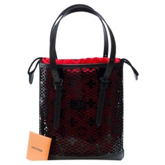 New Louis Vuitton Race Bucket bag in black patent leather