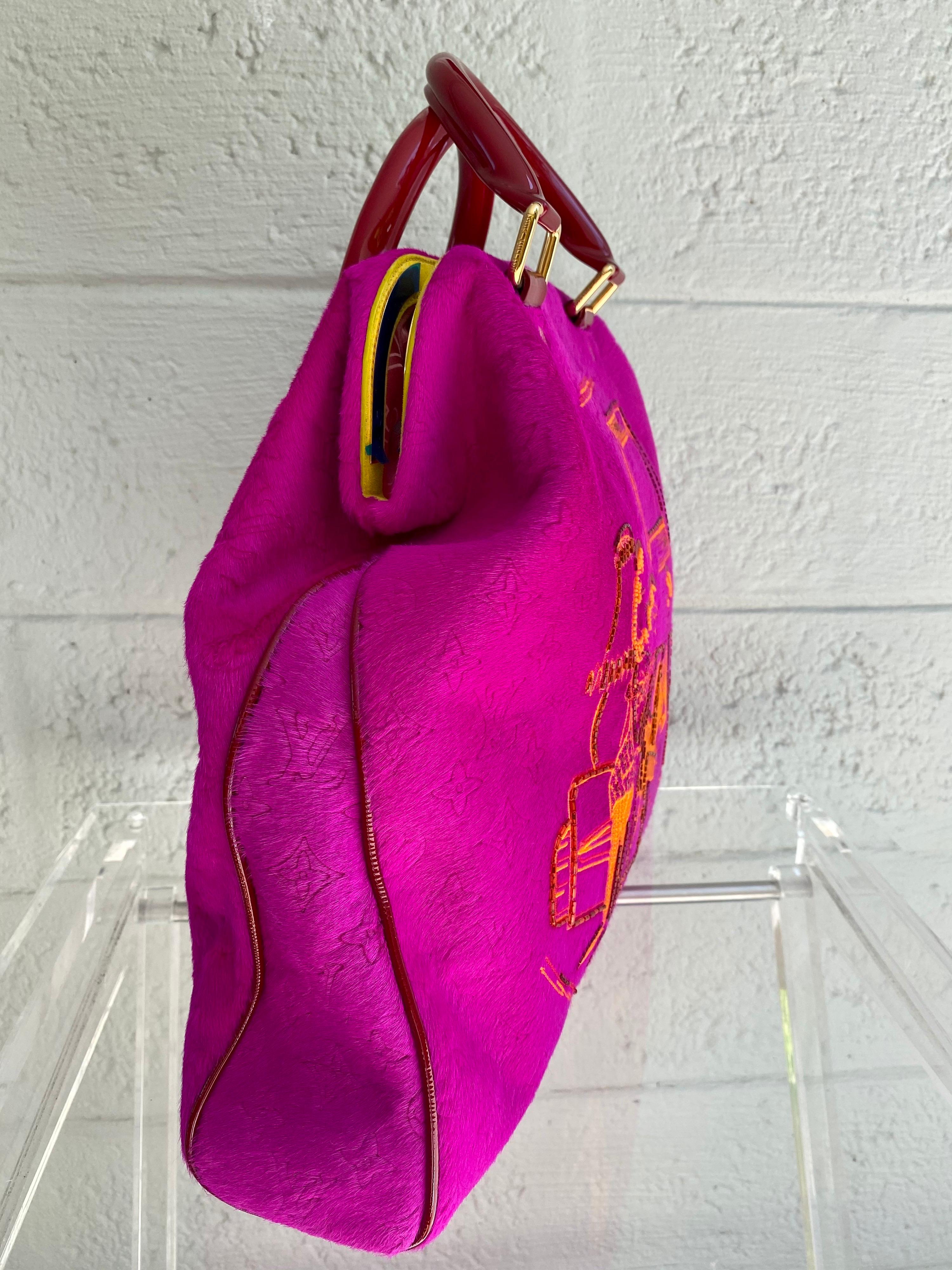 The extremely rare LOUIS VUITTON Fuchsia Cartoon Firebird, the most luxurious of them all. One of a kind and only a few were released Worldwide in 2008! Cartoon Limited Collection bag is part of the Spring 2008 Monogram Motard Collection. The