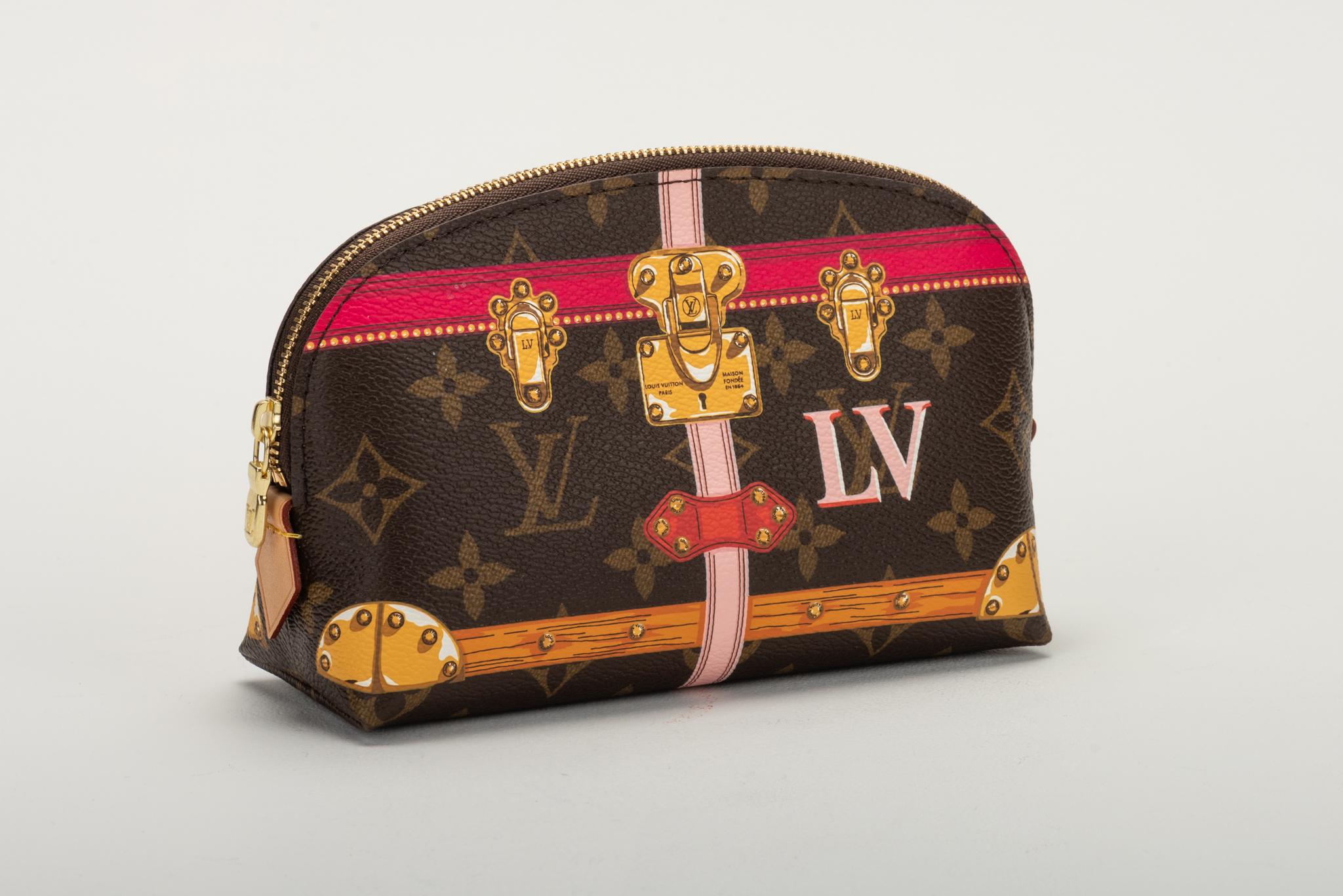 Louis Vuitton canvas monogram trunk cosmetic pouch with a pink and yellow design. Brand new 2018 collection. Comes with original dust cover, box, ribbon, and shopping bag.