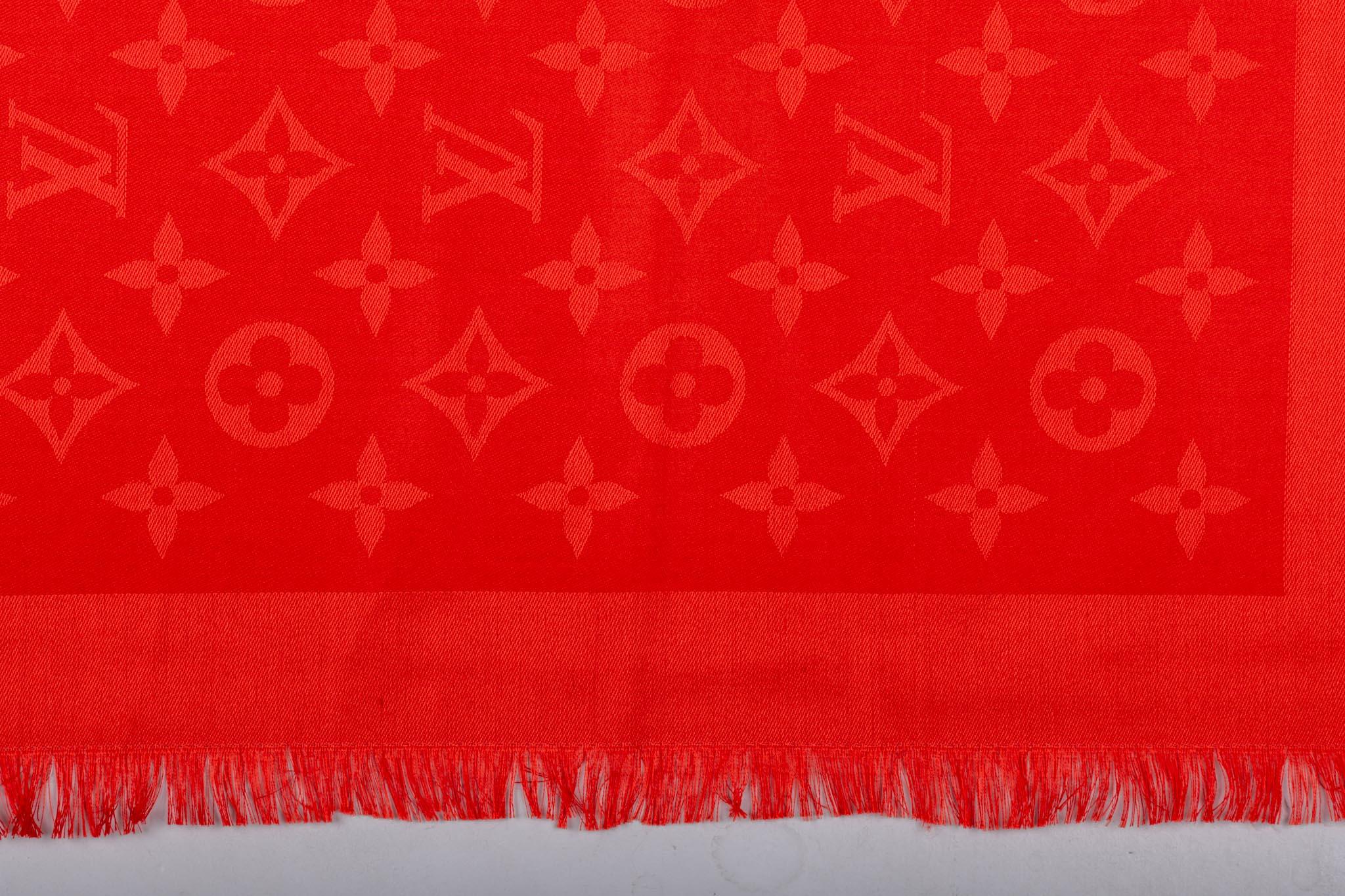 Louis Vuitton authentic red fringed logo scarf. Wool and silk combination. Brand new.