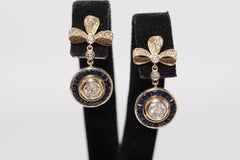 New Made 18k Gold Natural Diamond And Caliber Cut Sapphire Bow Drop Earring