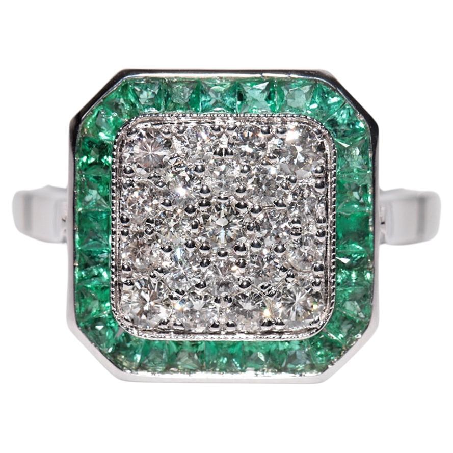 Anillo decorado con diamantes naturales y esmeraldas talla calibre en oro de 18k de nueva factura