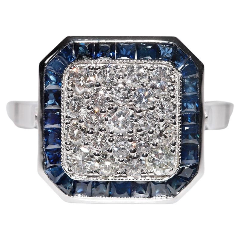 Anillo decorado con diamantes naturales y zafiros talla calibre en oro de 18k de nueva factura