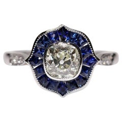 Bague solitaire en or 18 carats de fabrication récente, avec diamant naturel et saphir calibré
