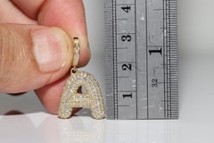 Pendentif lettres en or 18 carats, neuf et décoré de diamants naturels