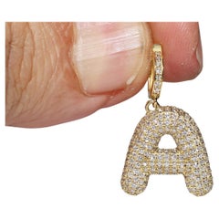 Pendentif lettres en or 18 carats, neuf et décoré de diamants naturels