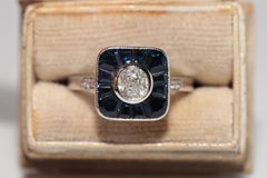 Anello New Made in oro 18k con diamante Nature e zaffiro Baguette