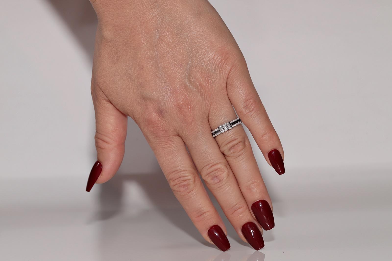 In very good condition.
Total weight is 3.2 grams.
Totally is white diamond 0.52 ct.
The white diamond is G-H color and vs-s1 clarity.
Totally is black diamond 0.27 ct.
Ring size is US 6.5
We can make any size.
Box is not included.
Please contact