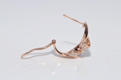 Orecchino nuovo in oro rosa 18 carati, di seconda mano, con diamante naturale e chiusura Omega